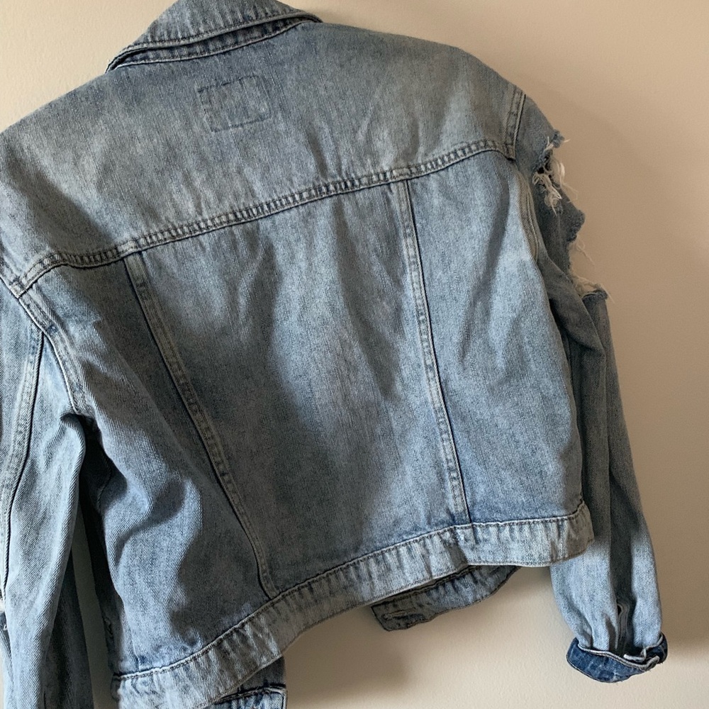 Light wash cropped distressed denim jacket